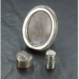 An imported .925 Sterling silver oval photograph frame, marked '*336 FI' '925' and London import