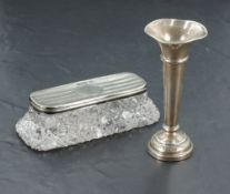 A small Elizabeth II silver trumpet form spill vase, marks for Birmingham 1977, maker Joseph Gloster