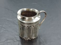 An Edwardian silver cream jug, of shouldered cylindrical form with short rim and spout, the body