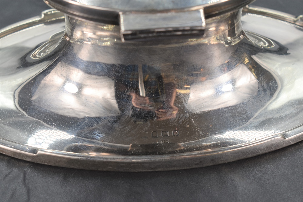 A George V silver Capstan inkwell, of oval form, the flared base rim with integral pen stands, marks - Image 3 of 3