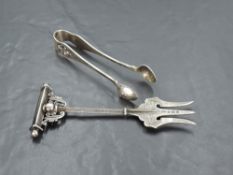 A late Victorian silver trident cold meat fork, with engraved detail and T-form terminal with