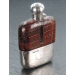 A George V Silver, leather and glass hip flask, of traditional form with spherical screw-lock hinged