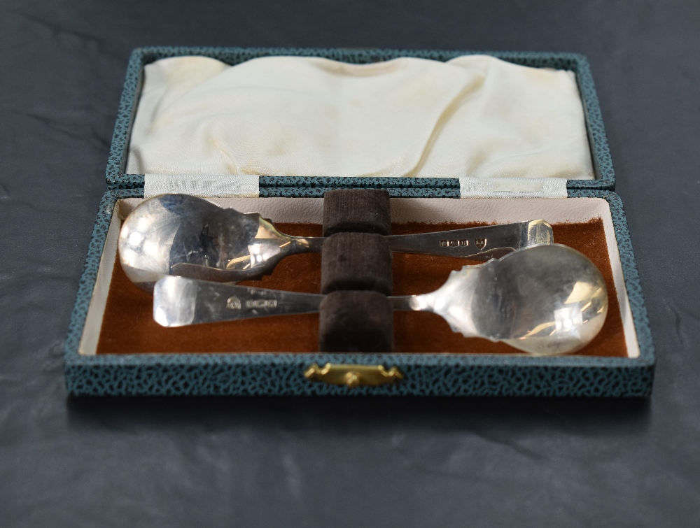 A 1940's cased set of two silver preserve spoons, of shaped but plain form with shallow bowls, marks - Image 2 of 2