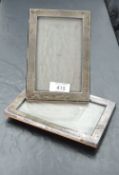 A pair of George V silver photograph frames, of plain rectangular form, marks for Birmingham 1919,