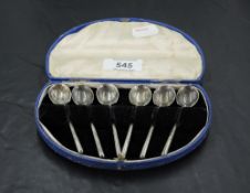 A cased set of six silver coffee spoons, marks for Sheffield 1929, all housed in a hinged demi-