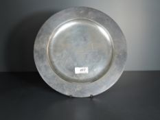 An Edward VII silver plate, of dished circular form with pronounced booge, with later presentation