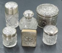 A selection of Edwardian silver mounted dressing table wares, comprising a hair brush, various