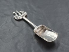 A .925 grade white metal sugar shovel, with masted ship surmount, the shovel with engraved acorn