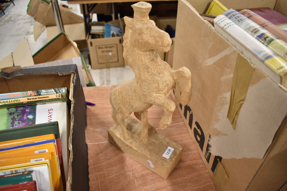 A wooden carved horse