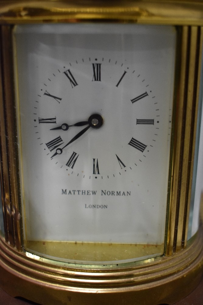 A 20th century Matthew Norman carriage clock having brass case with visible escape movement - Image 3 of 3