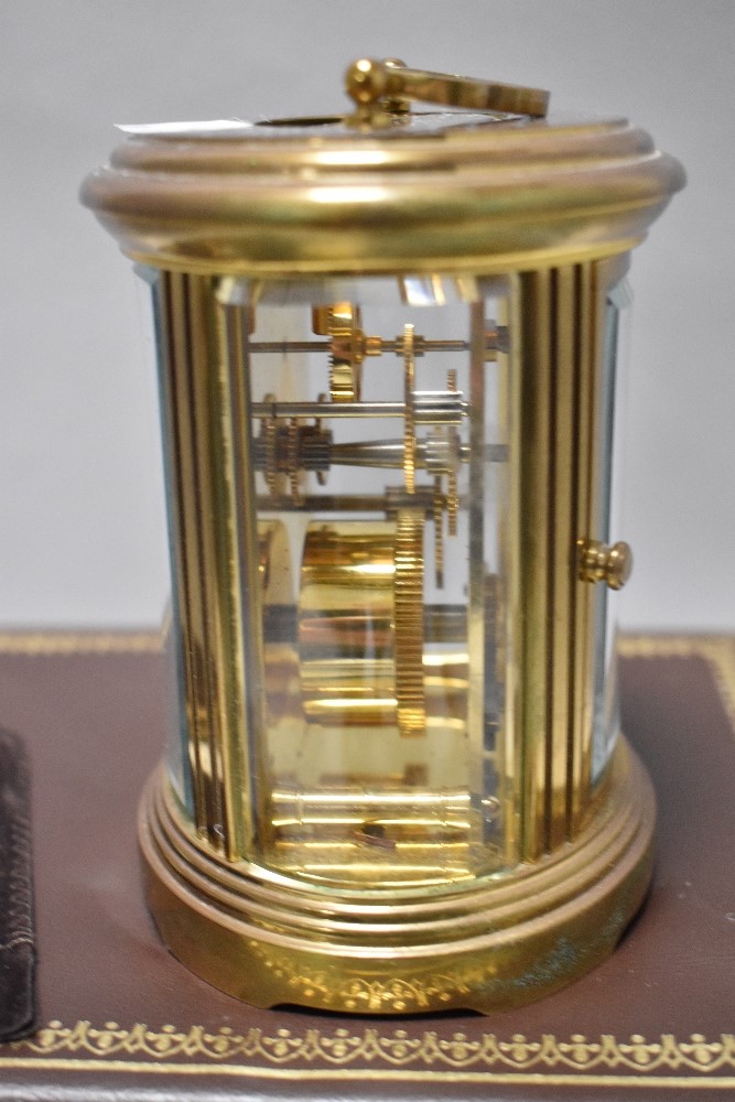 A 20th century Matthew Norman carriage clock having brass case with visible escape movement - Image 2 of 3