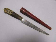 An Indian or Persian knife with sheath having horn handle with wire work grip