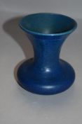 An early 20th century Royal Lancastrian pottery trumpet vase having blue glaze no2771