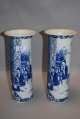 A pair of Chinese porcelain tall stem vase both decorated in blue and white with four character seal