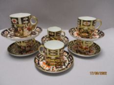 Five Royal Crown Derby Imari 2431 pattern coffee cups and saucers with an additional RCD tea cup and