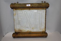 An Art Deco era light up theatre or cinema sign for Exit with arrow
