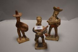 Three 20th century terracotta figurines of Mexican Mariachi band
