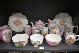 A selection of Victorian pink German lustre wares including teapots plates and jugs etc