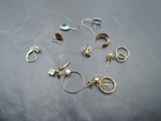 A selection of 9ct gold and yellow metal earrings including oddments, Free masons etc, approx 5g