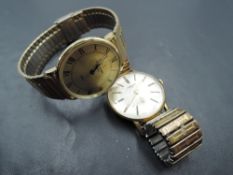 A gent's vintage Longines wrist watch no: 569, having baton numeral dial with subsidiary seconds