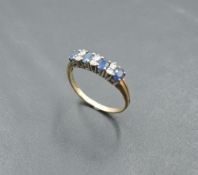 A sapphire and diamond half eternity ring on a 9ct gold loop, size Q & approx 2.2g