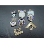 A small selection of HM silver Masonic jewellery including pendant, brooch and two enamelled