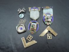 A small selection of HM silver Masonic jewellery including pendant, brooch and two enamelled