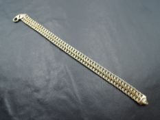 A 9ct gold fancy link bracelet with dog leash clasp, approx 5.5g