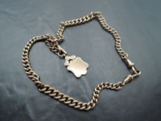 A 9ct rose gold double Albert watch chain with T bar and plain 9ct gold shield fob, approx 16' &