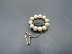 A Victorian split pearl and yellow metal brooch of petit oval form, no marks tests as gold