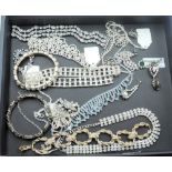 A selection of diamante jewellery including bracelets, necklaces, earrings, brooches and bangle