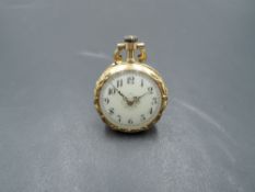 A French yellow metal miniature pocket/pendant watch bearing marks, probably 18ct gold, having