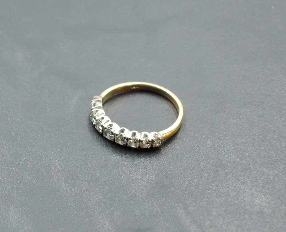 A nine stone diamond half eternity ring in claw set mounts on an 18ct gold loop, size L & approx 2. - Image 2 of 4