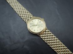 A gent's 9ct gold quartz wrist watch by Imperialto having Arabic numeral dial with date aperture