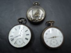 An HM silver key wound pocket watch, Continental silver top wound pocket watch and empty HM silver