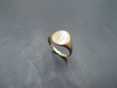 A gent's 9ct rose gold signet ring bearing monogram, size W & approx 3.4g