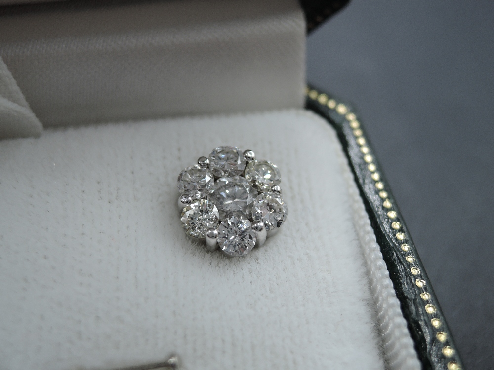 A pair of seven stone diamond cluster stud earrings, each approx 0.5ct in 18ct white gold mounts - Image 2 of 4