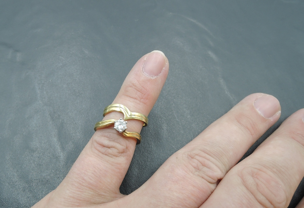 A diamond solitaire ring, approx 0.45ct in a six claw set mount to cross over shoulders on an 18ct - Image 3 of 3