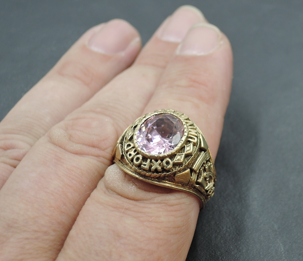 A 9ct gold Oxford University Graduation signet ring having central oval pink gem stone in a collared - Image 3 of 3