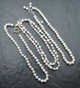 Three baroque pearl necklaces including multi pastel coloured etc