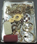 A selection of gilt costume jewellery including bangles, chains, cufflinks etc