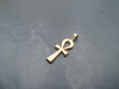 An Egyptian gold Ankh cross pendant, bearing worn marks, approx 3.1g
