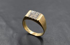 A gent's nine stone diamond panel ring, total approx 0.9ct in pave setting to satin textured