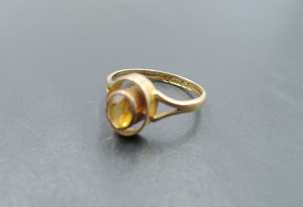 A small Victorian ring having oval citrine in open collared mount on 9ct gold loop, size K & - Image 3 of 3