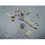 A small selection of yellow metal jewellery, many stamped 9ct including spider pendant, 'special