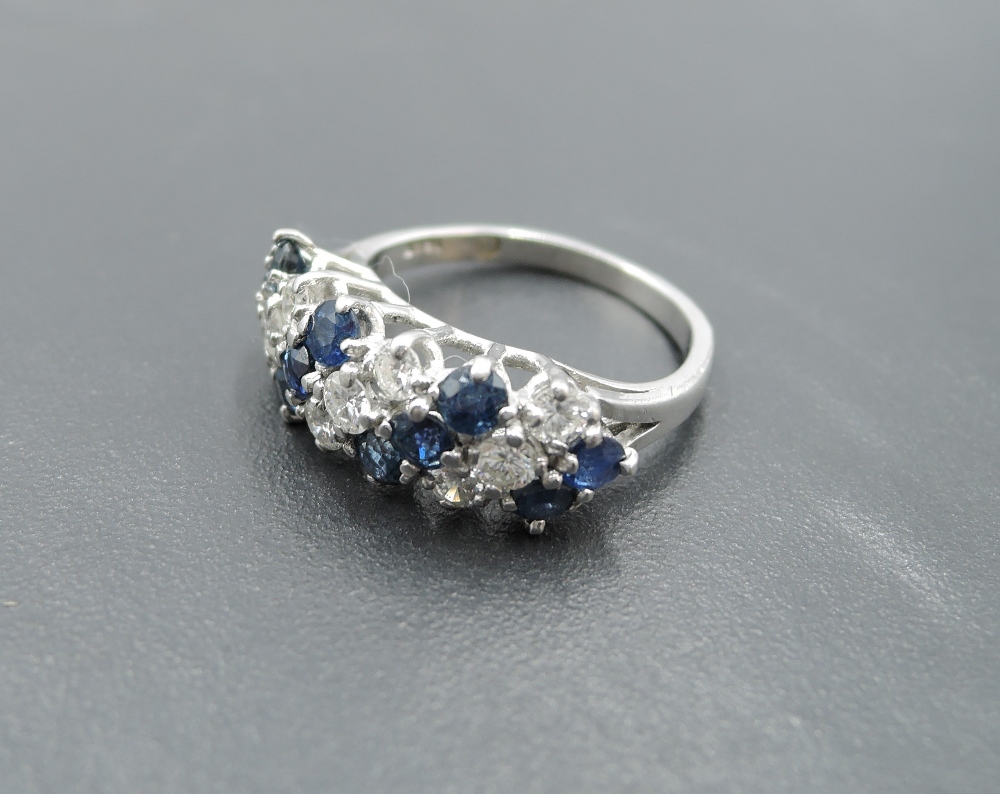 A sapphire and diamond seven row dress ring, total approx 1ct, having claw set panel mount on a - Image 2 of 3