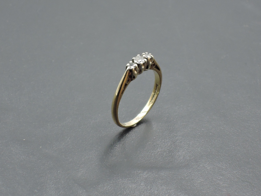 A diamond trilogy ring, total approx 0.15ct in claw set mount on a 9ct gold loop, size L & approx - Image 2 of 4