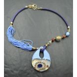 A large Italian designer Murano glass necklace by Antonnio Vaccari in tones of blue with bead,