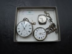 A silver small key wound pocket watch having Arabic numeral dial to decorative face in engraved