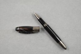 A Limited Edition Montblanc rollerball pen. A Writers Edition Tribute to Daniel Defoe. The pen is